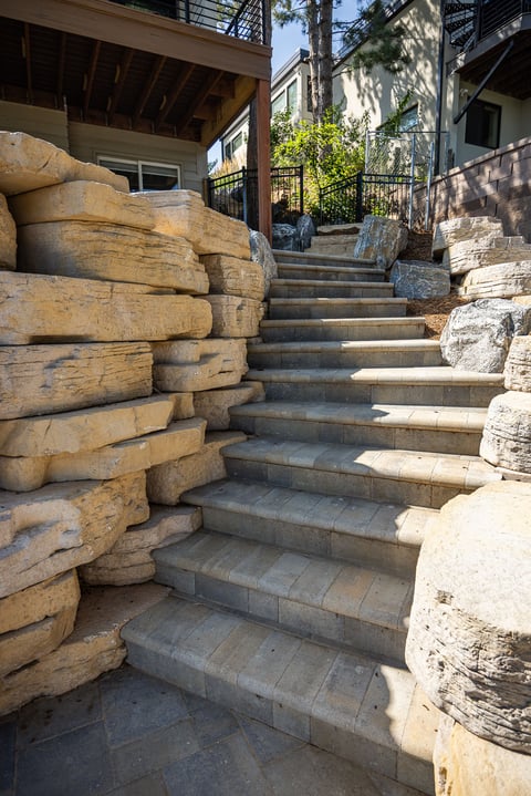 residential landscape design boulder retaining wall and steps 9