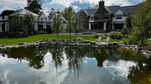 backyard pond with large pool and patio